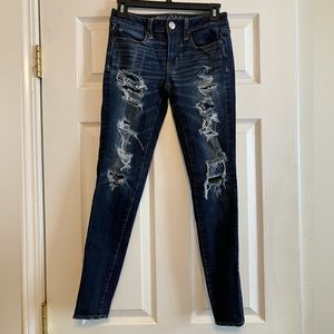 American Eagle 360 Super Stretch Jegging blue distressed ripped knees size 2 reg